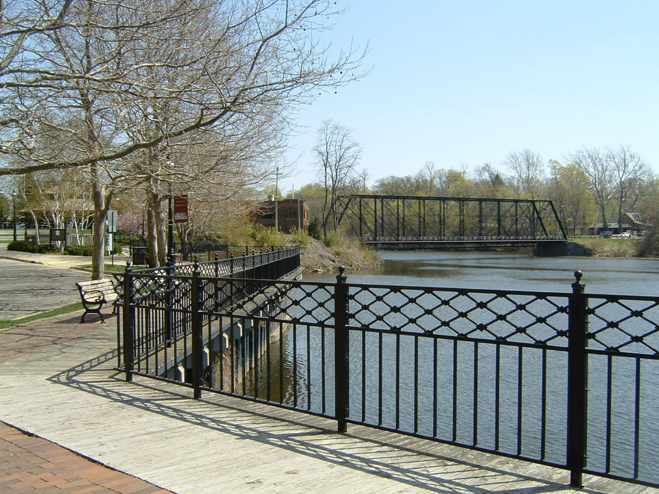Allegan, MI: Allegan's riverfront with historic Iron Bridge.