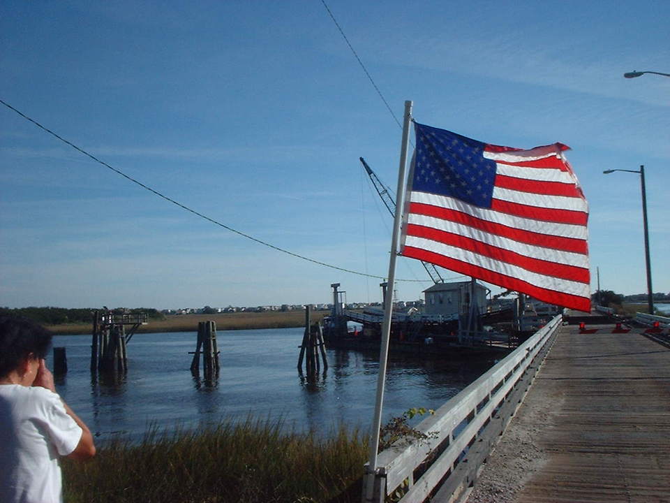 Sunset Beach, NC: United States Flag on Floating Bridge Sunset Beach NC