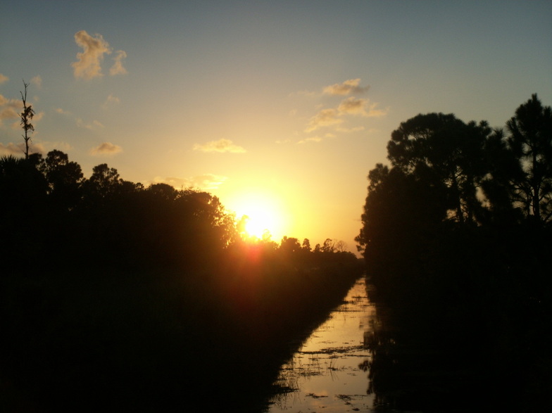 Fort Pierce, FL: Sunset over a canal at Rock Road and Orange Avenue in Fort Pierce