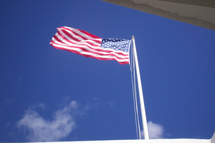 Honolulu, HI: Flag over USS Arizona Memorial