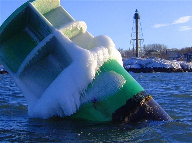Marblehead, MA: Harbor buoy and light, January