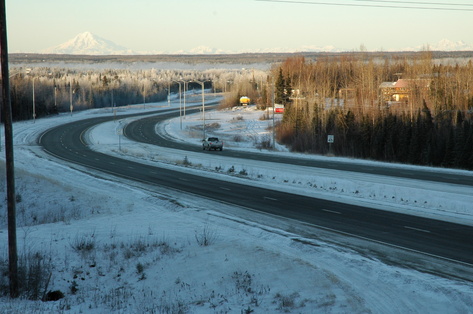 Sterling, AK: The east end of Sterling, looking west. Redoubt Volcano in background.