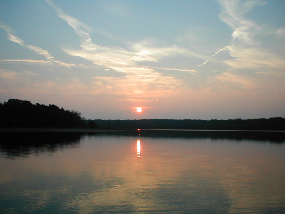 Bismarck, MO: Bismarck Lake in Missouri. Picture was taken from a boat out on the lake just before dark.