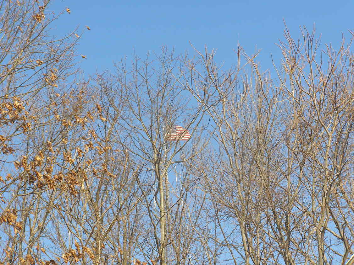 West Paterson, NJ: FLYING FLAG ON TOP THE MOUNTAIN ON A BEAUTIFUL JANUARY DAY