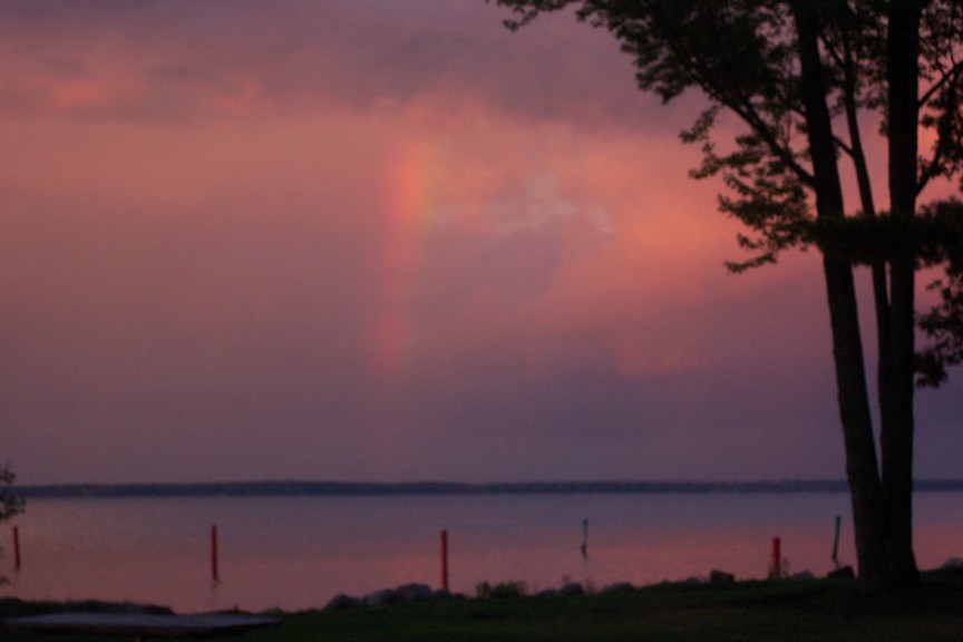 Houghton Lake, MI: Rainbow in a storm over Houghton Lake