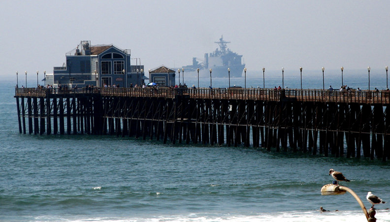 Oceanside, CA: Oceanside Pier with ghost ship approaching. A strong military presence keeping us secure at home.