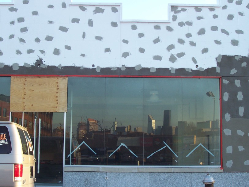 New York, NY: Greenpoint Brooklyn Storefront with Reflection of Manhattan Skyline