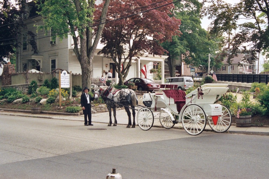 Southbridge, MA: Yves-Lynn Horse & Carriage Company arrives at Vienna Restaurant on South Street