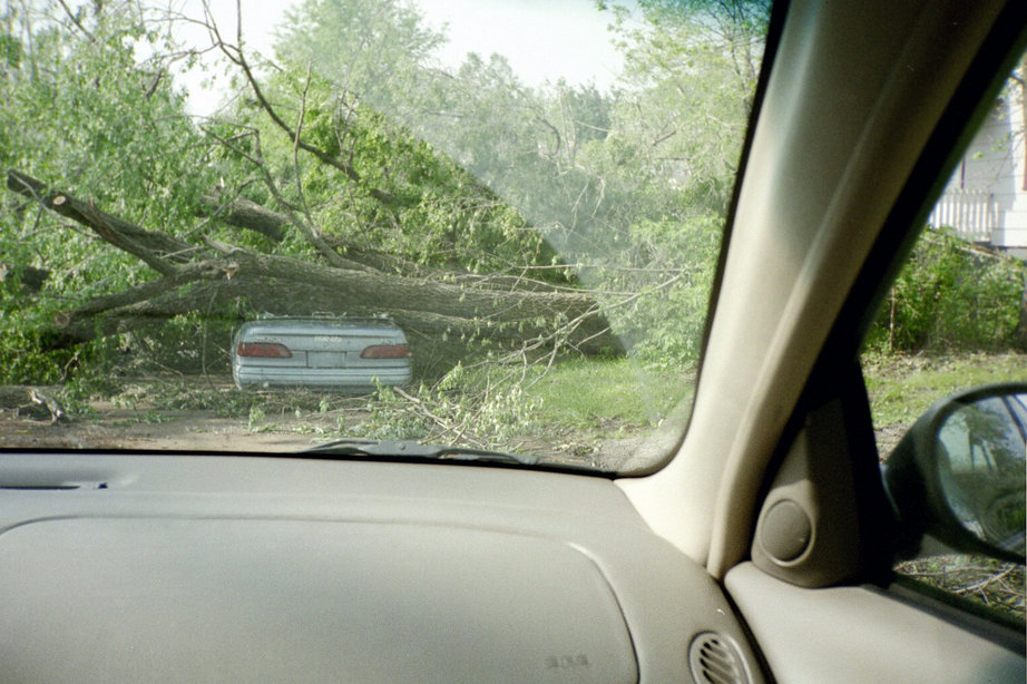 De Soto, MO: Tornado in May, 2003: Tree on car with bumper sticker reading "Fear God"