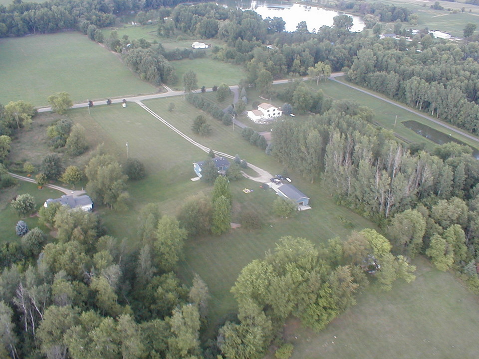 Mulliken, MI: E. Eaton Hwy., Mulliken w/ view of Cryderman Lake- August 24, 2002