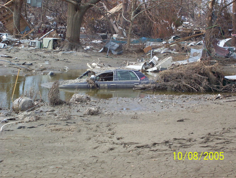 Cameron, LA: Police Car buried in distruction