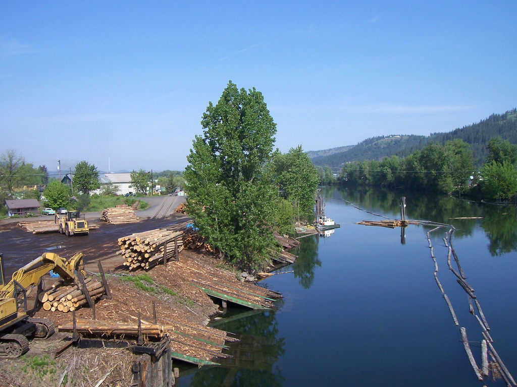 St. Maries, ID Log decks along the St. Joe River and Tug boats photo