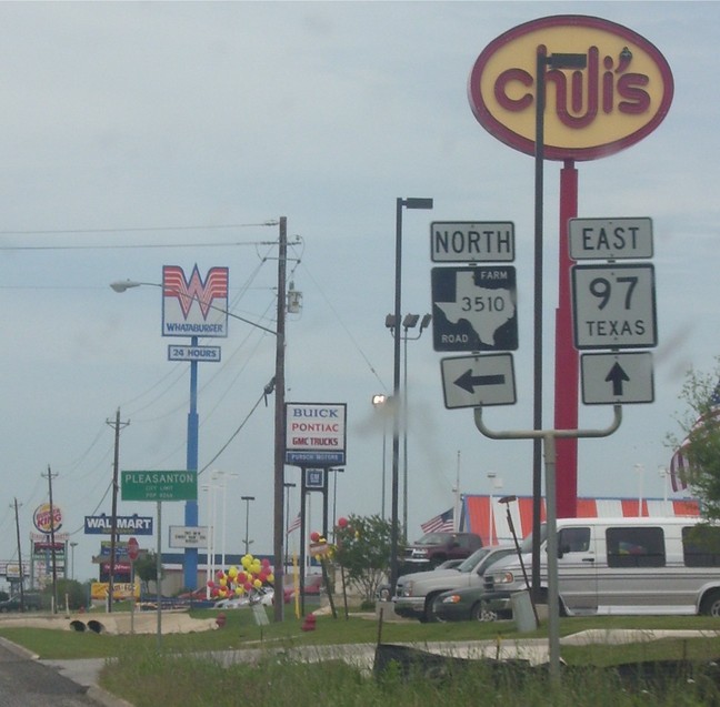 Pleasanton, TX: The signs of businesses along Hwy. 97 in Pleasanton, Texas