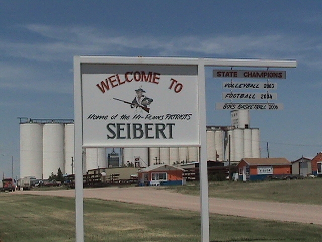 Seibert, CO: Welcome Sign in Seibert Colorado, with the grain silos in the background.