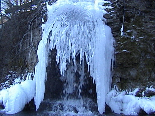 Winslow, IL: Paradise Cove waterfall in winter