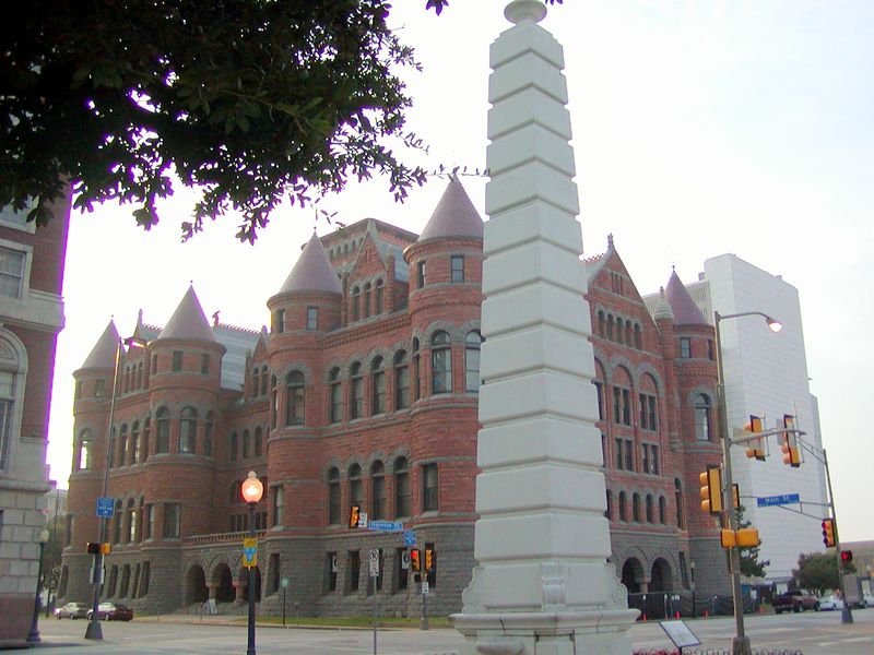 Dallas, TX: "Old Red" The Old Red Courthouse was built in 1881 in the Romanesque style with Pecos red sandstone, Texas red granite, and Arkansas blue granite. This photo was taken from Dealy Plaza accross the street.