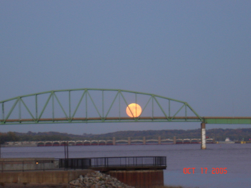 Muscatine, IA: The Moon Rising Over Muscatine