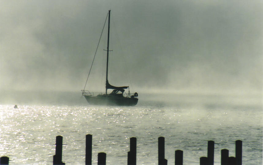 Harbor Springs, MI: Early morning mist on the harbor 20077