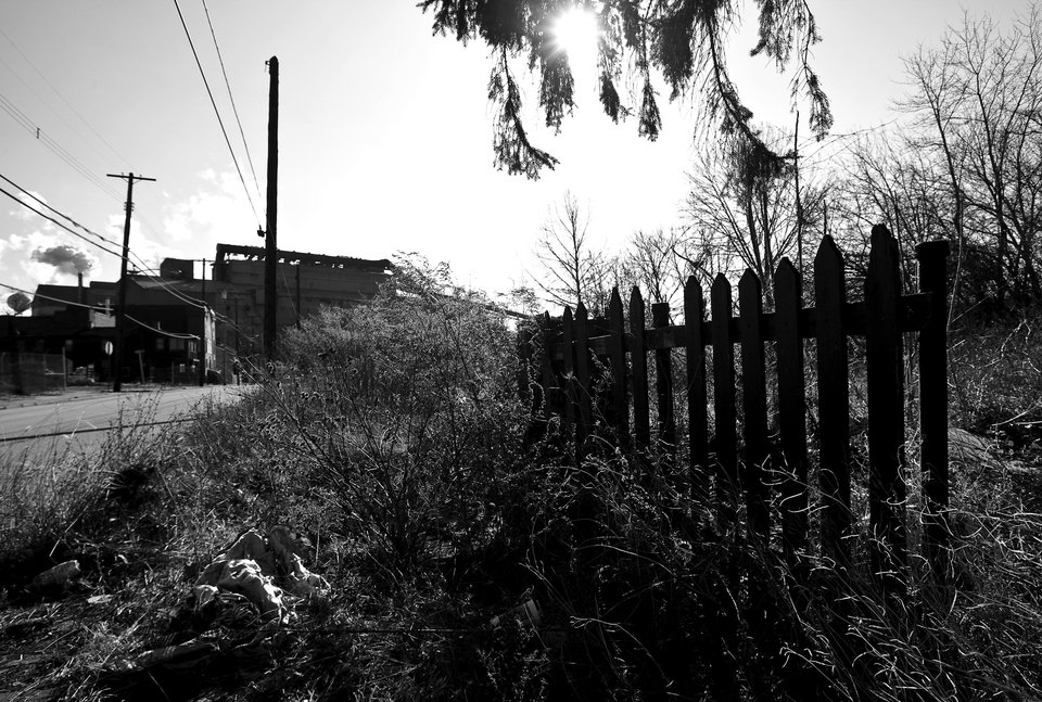 Braddock, PA: Lone fence along Woodlawn Ave. Braddock Borough, Pittsburgh, PA.