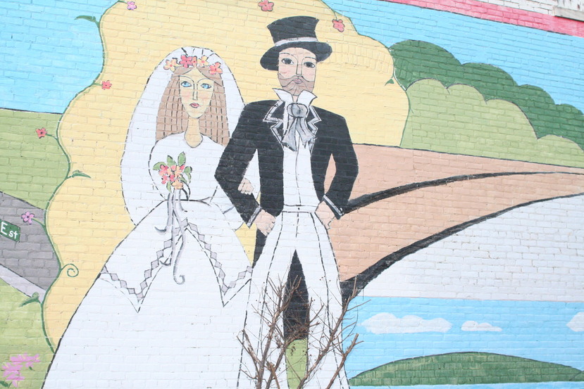 Grenada, MS: Wall Mural of two towns that joined in marriage to make Grenada