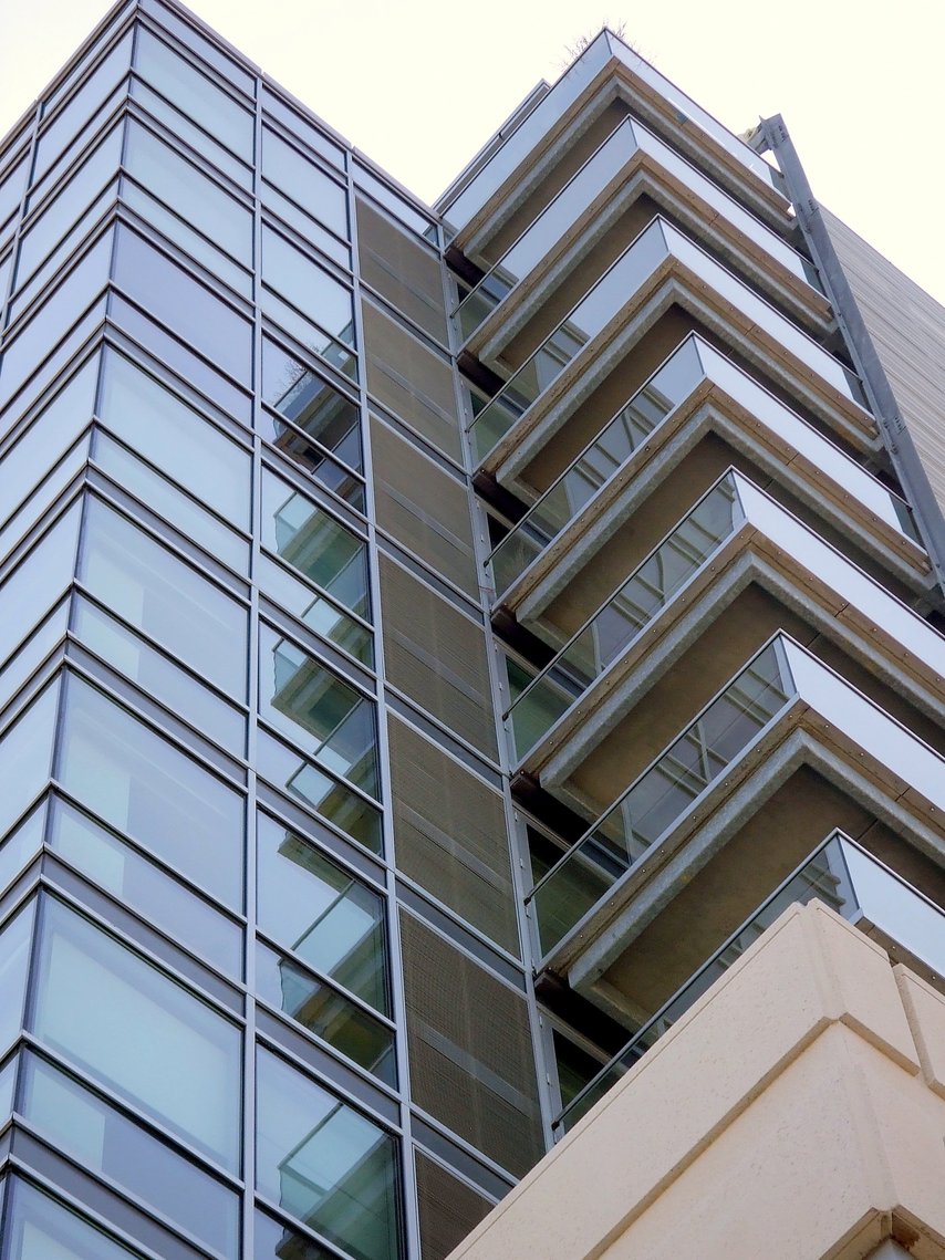 Iowa City, IA: A street-level view of the Plaza Towers in downtown Iowa City.