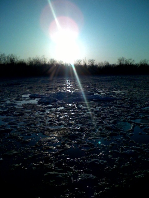 Erie, PA: frozen beach at sunset