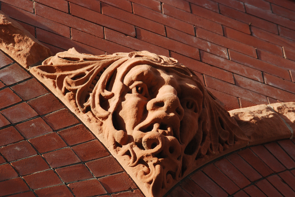 Clarksburg, WV: Sunsetting on one of the "Gargoyles" on the Hornor Brothers Building