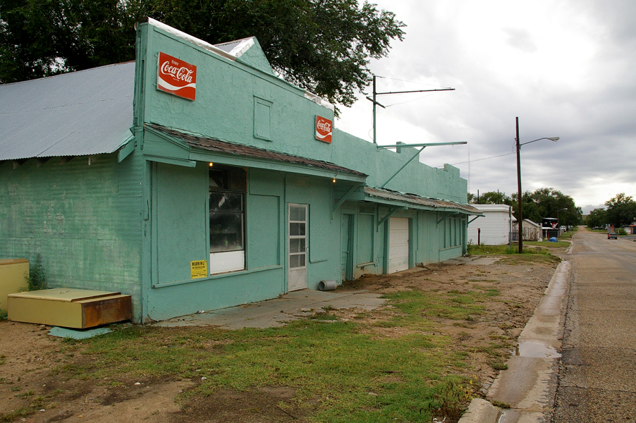 Lefors, TX: A COMMERCIAL BUILDING along East 2nd Street appears well-maintained but has no business signs posted.
