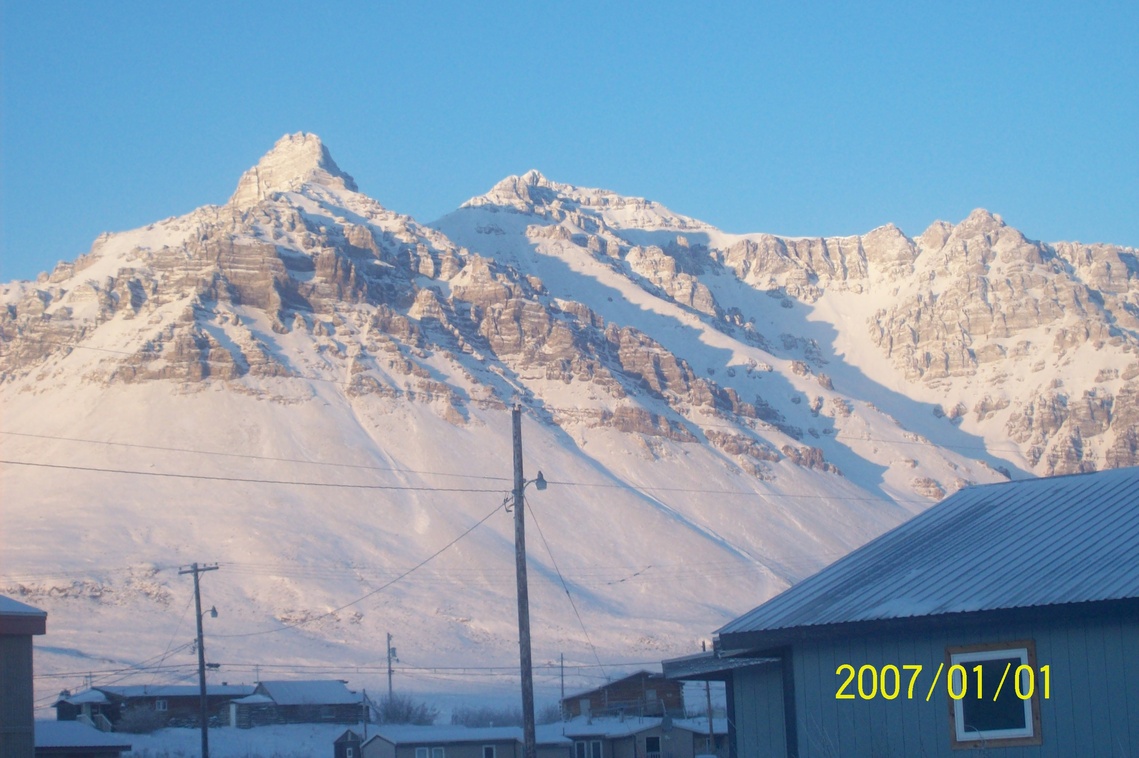 Anaktuvuk Pass, AK Sun is finally coming over the mountains.. photo