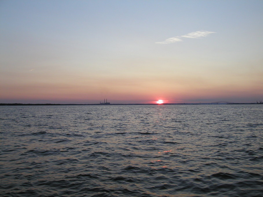 Pasadena, MD: Sunset between the power plant and the Key Bridge