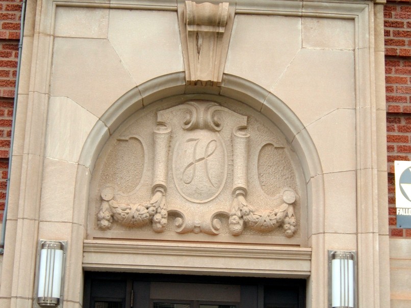 Hibbing, MN: Carved in Stone Village Signature above West Entrance of Village Hall.