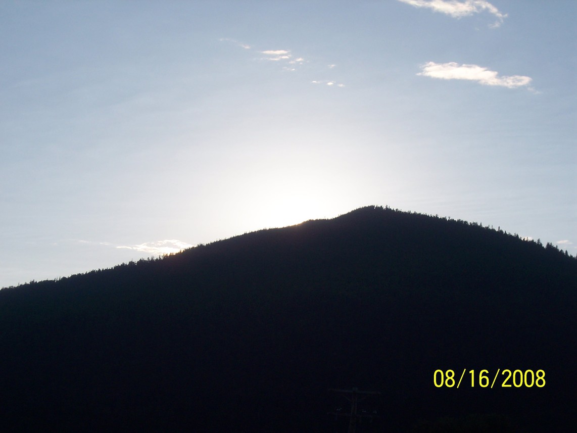 Colebrook, NH: the sun seting over the mount manadnock