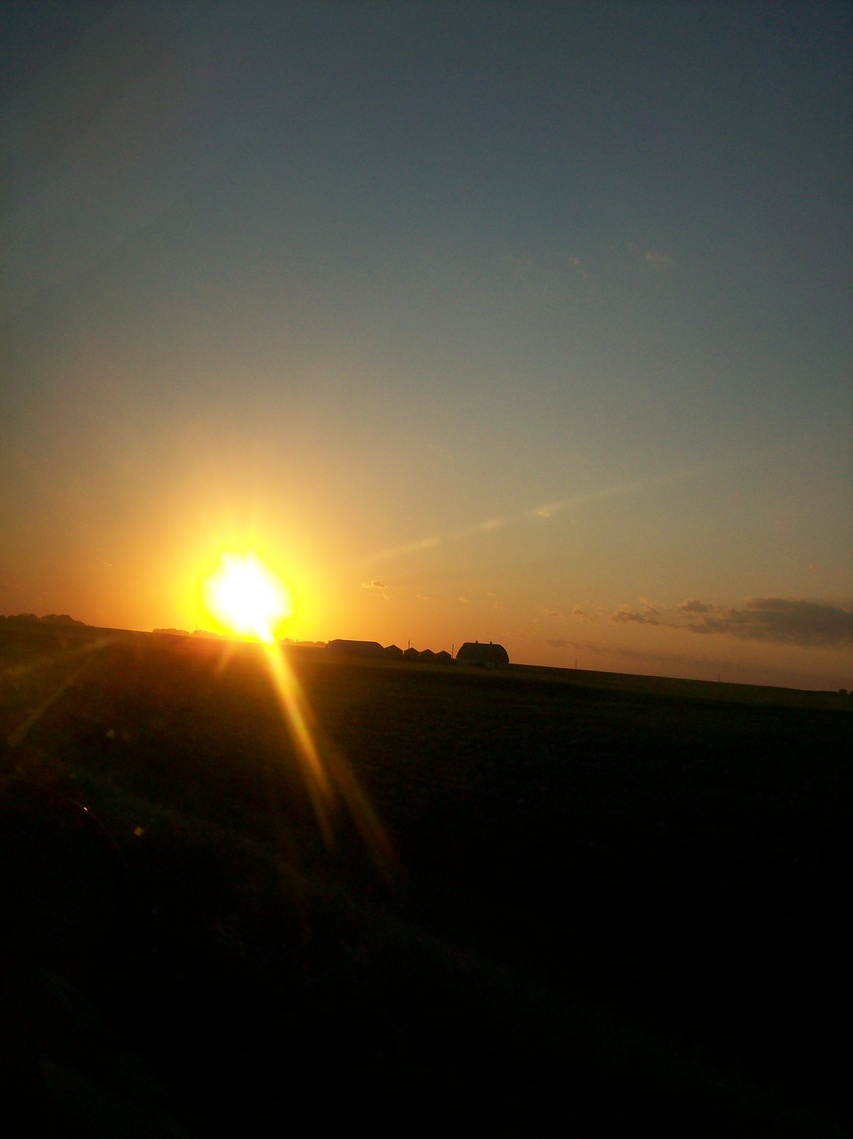 Kerkhoven, MN: sunset over farm outside kerkhoven