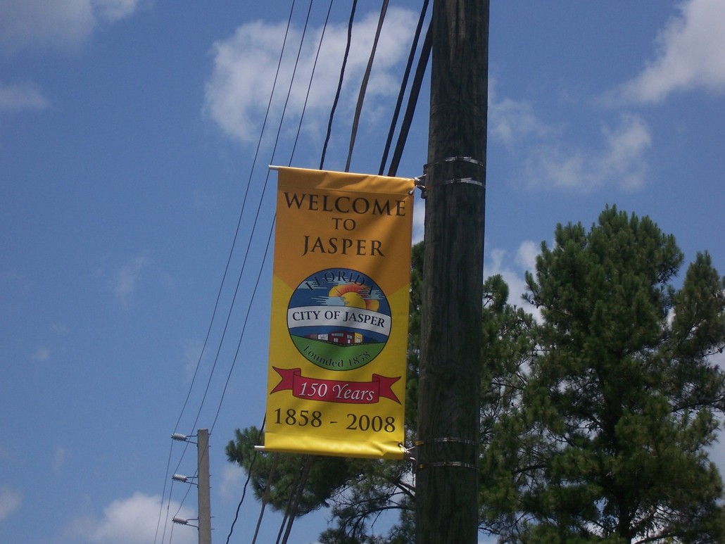 Jasper, FL: 150 year anniversary banner at the entrance of town