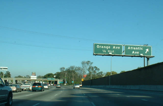 Carson, CA: i-405 Atlantic Avenue has a place as an historic route of significance for the Los Angeles Area. At one time, Atlantic Avenue was a state route (California 15), and it served as the endpoints for two former U.S. routes. The intersection of Atlantic Avenue and California 1/Pacific Coast Highway in Long Beach was the southwestern terminus of formerly transcontinental U.S. 6 and U.S. 91. Both were paired with decommissioned Alternate U.S. 101 along Pacific Coast Highway (U.S. 6 along southbound Alternate U.S. 101 and U.S. 91 along northbound Alternate U.S. 101 as Alternate U.S. 101 approached this intersection) Southbound Interstate 405 at Exit 25, Palo Verde Avenue. Photo taken 06/15/03.