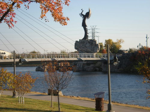 Wichita, KS: Suspension Bridge Over River to Keeper of the Plains