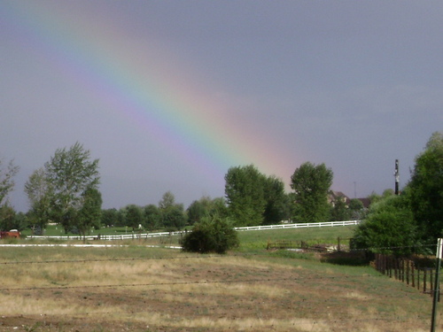 Meridian, ID: July 2007, We were coming home from the Boise River, and a rainstorm blew in. Left a beautiful rainbow. Pulled over was taken on Linder Ave.