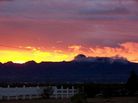 Golden Valley, AZ: Sunset behind the Black Mountains. Taken from front porch