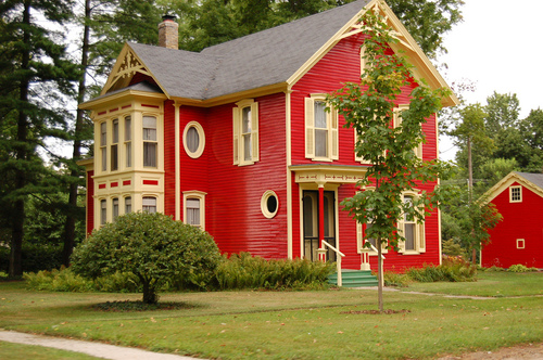 Paw Paw, MI: Red and Yellow "Circus House" in Lawrence, Michigan