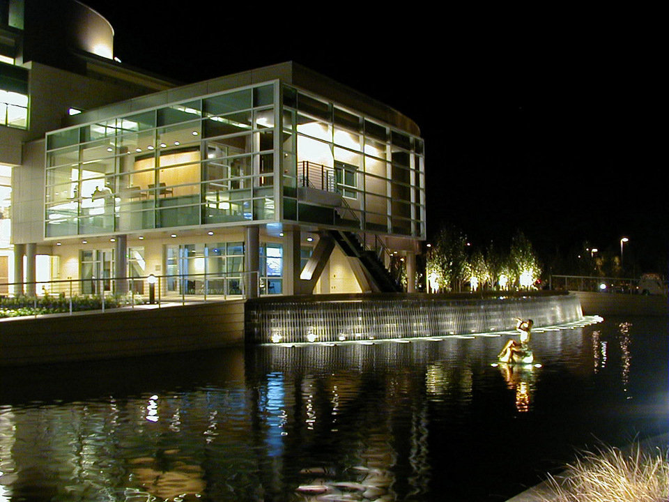Milpitas, CA: Milpitas City Hall at night. Pond side, with Pan sculpture.