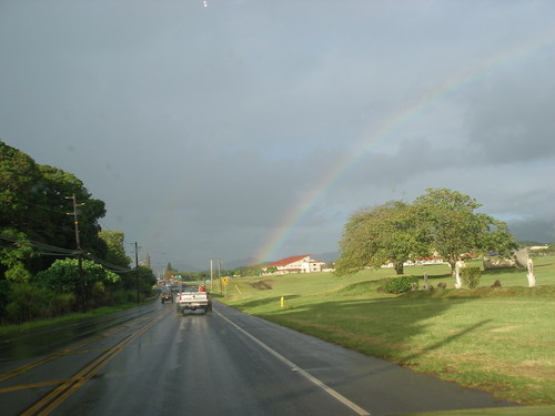 Lihue, HI: An early morning rainbow that ends in front of the Kauai Community College