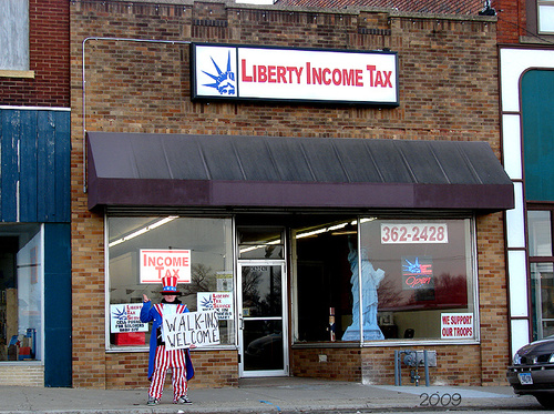 Estherville, IA: One tax preparer in Estherville "wants you" so strongly, he hired Uncle Sam to reel 'em in.