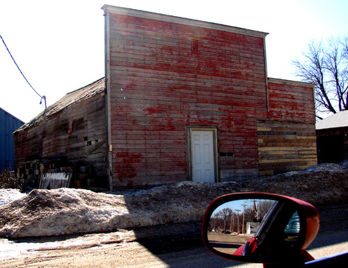 Wallingford, IA: Know the history of this red-faced building? Neither did I.