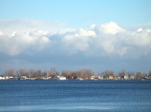 Sodus Point, NY: Early winter storm clouds build up over "The Loop," in the village of Sodus Point, NY, on Lake Ontario.