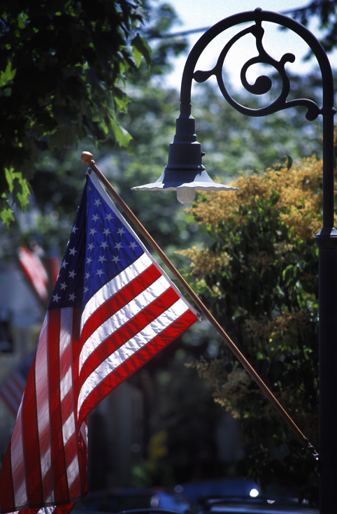 Southampton, NY: American flag along Jobs Lane, fourth of July, Southampton Village, Long Island, NY