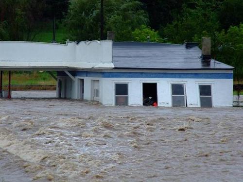 Mystic, IA: Young's Gas Station during the flood Aug. 2007