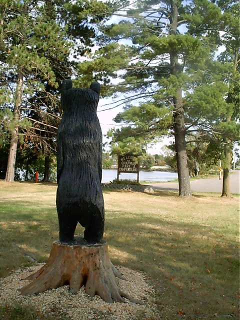 Stanley, WI: Hand carved bear guards the entrance to Chapman Park