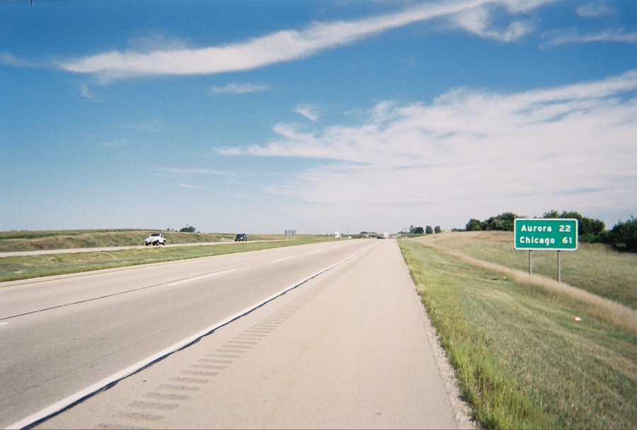 DeKalb, IL: Interstate 88 - {I-88} East-West Tollway - De Kalb, IL - De Kalb County. Facing east towards Aurora and Chicago. Lush grasslands, wheatfields and farmland surround rural De Kalb County, IL.