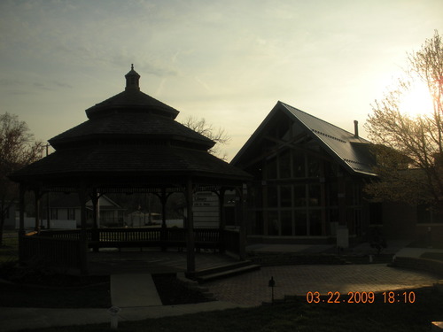Glen Carbon, IL: Silhouette of the Glen Carbon Centennial Library and the gazibo at sunset.