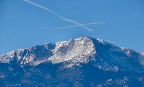 Colorado Springs, CO: Pikes Peak with cross contrails